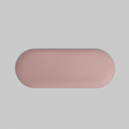 Soporte de mano para aspiradora empotrada ÜLKA en color rosa claro.